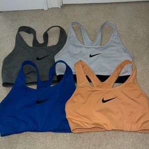 4 NIKE SPORT BRAS WOMENS SIZE MEDIUM